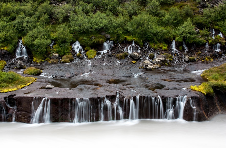 The cascades of Hraunfossar waterfalls