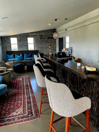 The cozy lounge and bar area at Hotel Godafoss in North Iceland.