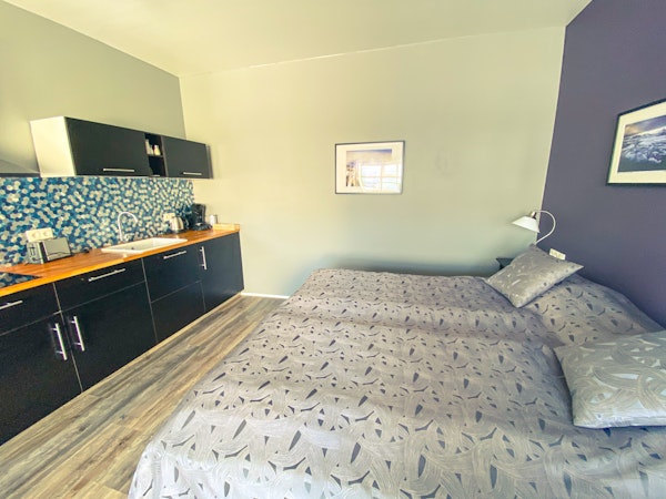 Relax in style and comfort in the well-appointed bedrooms of Bakki Apartments & Hostel.