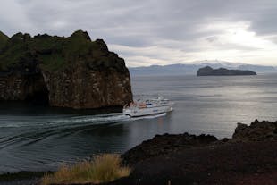 Board the Vestmannaeyjar ferry for an exciting sea voyage to the captivating Westman Islands, a paradise of natural wonders.
