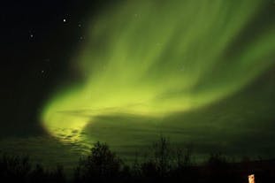 The Northern Lights, a celestial spectacle that paints the night skies with enchanting hues, making your Iceland journey even more magical.
