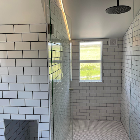 A bathroom in a suite at Hotel Godafoss in North Iceland.