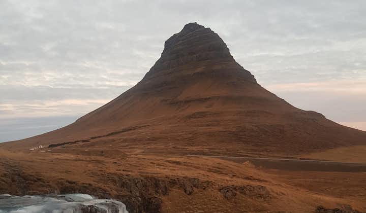 The iconic Kirkjufell Mountain is one of the most photographed landmarks in Iceland, drawing visitors from around the world to its striking beauty.
