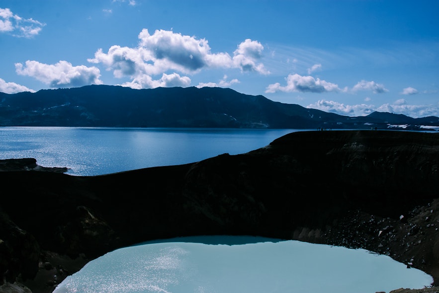 The Viti crater lake in Askja in Iceland with views of surrounding mountains