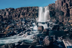 Experience tranquility amidst the picturesque Öxarárfoss waterfall on our Private Golden Circle Tour.