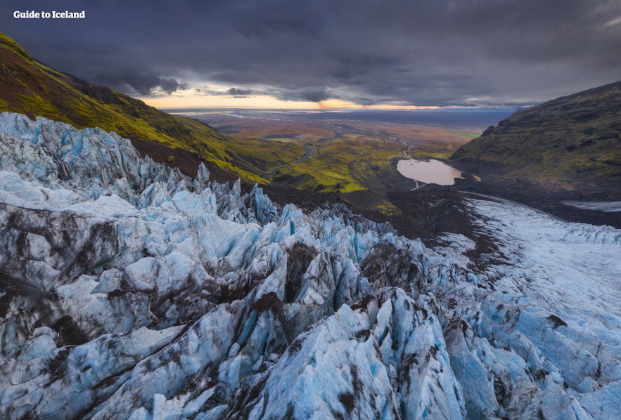 View from the Vatnajokull glacier with a dramatic sunset and dark clouds