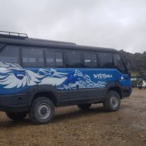 The reliable bus awaits for your scenic Landmannalaugar transfer.