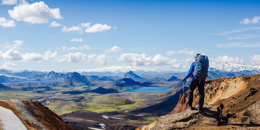 Man hiking in the Icelandic highlands would likely benefit from using the AllTrails app