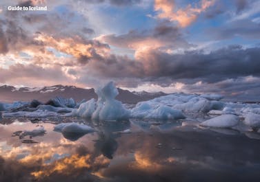 Jokulsarlon glacial lagoon is a breathtaking sight with floating icebergs showcasing the beauty of Iceland's glaciers.