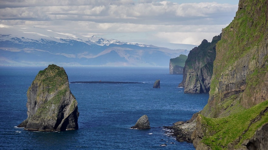 The cliffsides of the Westman Islands are dramatic and you can see to the south coast of Iceland from there