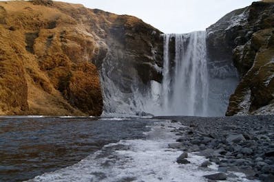 The Skogafoss waterfall has a flat ground for the best viewing experience.