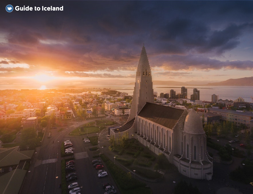 The Hallgrimskirkja church dominates the skyline amid Reykjavik's urban landscape.