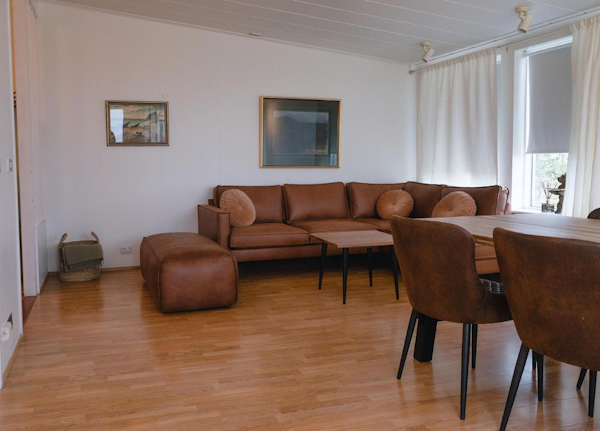 Guests can relax on one of the comfortable sofas of the Golden Circle Luxury Cottages..