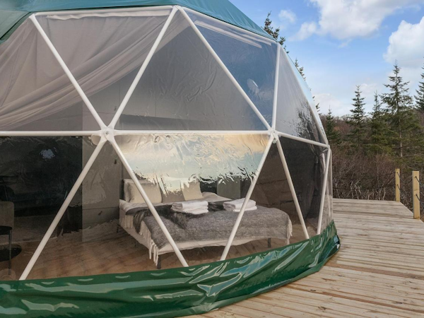 Golden Circle Domes has transparent sides with curtains for privacy.
