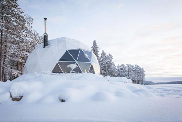 Snow covers the surroundings of the glamping domes in the Golden Circle.