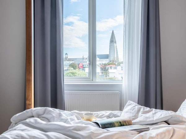 A room with a view of the city and the iconic Hallgrimskirkja church in Reykjavik.