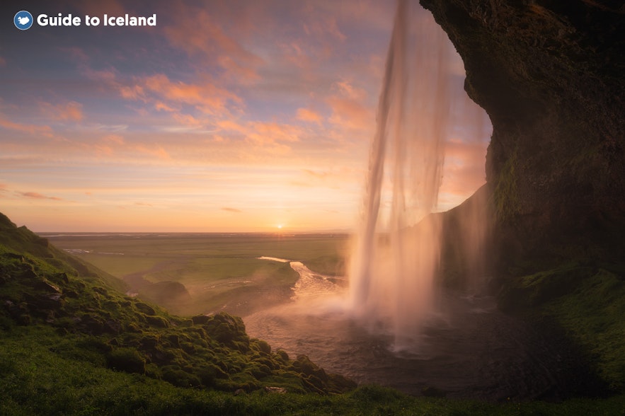 A picture taken from behind Seljalandsfoss.