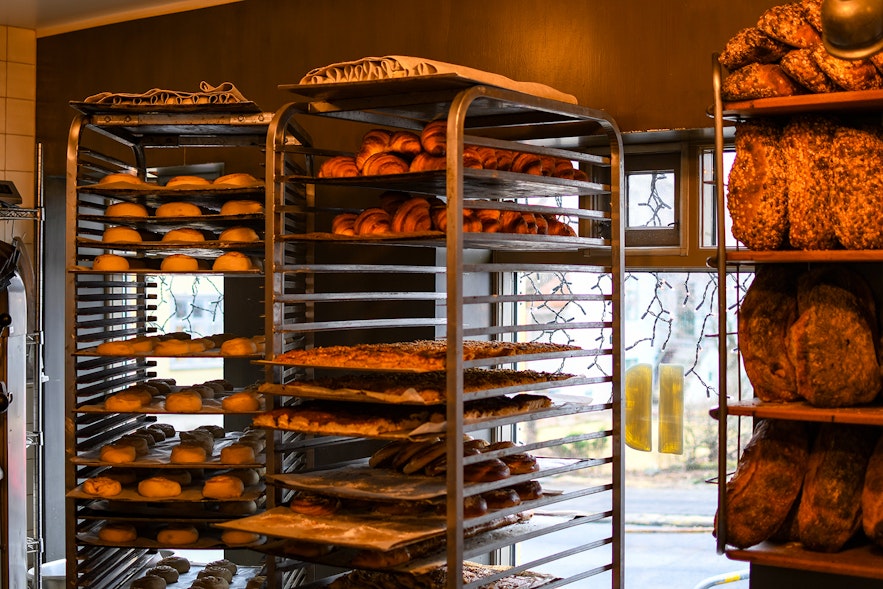 The interior of Braud & Co with its signature stack of trays filled with freshly baked pastries and bread