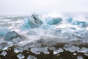 Glistening ice diamonds scattered along Iceland's enchanting Diamond Beach.