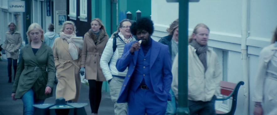 Reggie being caught in Iceland in the movie War on Everyone
