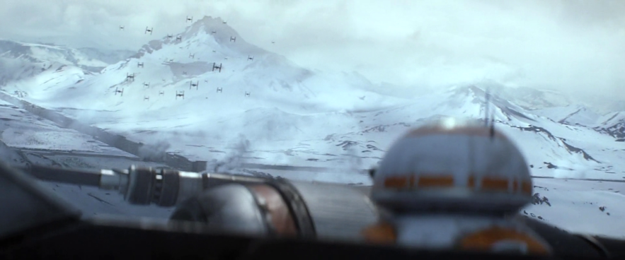 BB-8 looks on as a fight in the sky takes place over Iceland