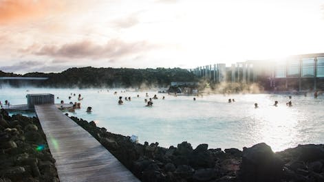 Immerse in the soothing azure waters of the Blue Lagoon, surrounded by volcanic beauty.