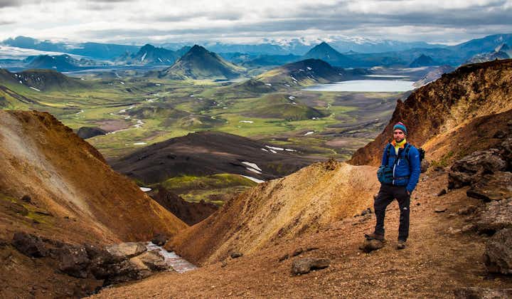 A hiker enjoying a rest while exploring Iceland's Laugavegur trail.
