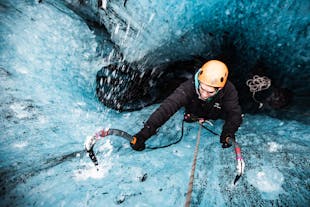 A person tries their hand at the exciting activity of ice climbing in Vatnajokull National Park.