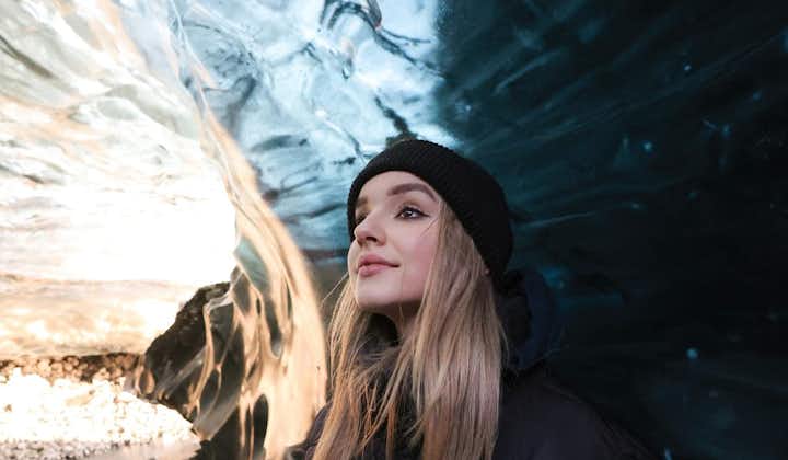 A photograph of a person in an ice cave.