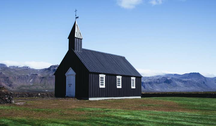 The black Budir church is one of the best photography spots on the Snaefellsnes Peninsula, a perfect contrast to its natural surroundings.