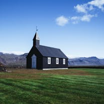 The black Budir church is one of the best photography spots on the Snaefellsnes Peninsula, a perfect contrast to its natural surroundings.