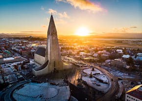 The Hallgrimskirkja church and the rooftops of Reykjavik during winter in Iceland.