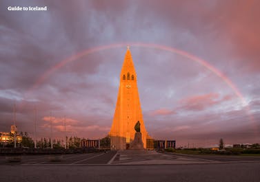 Hallgrimskirkja church with a rainbow above it in Reykjavik.