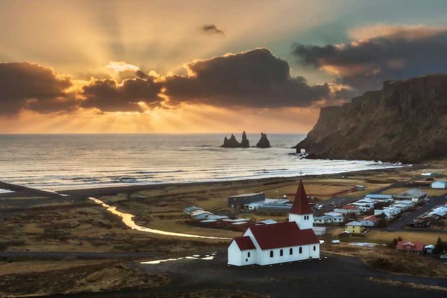 The town of Vik features dramatic rock formations along the coast