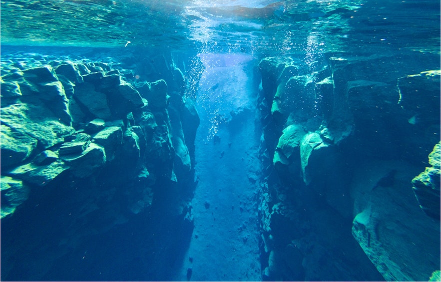 Iceland is home to the only place where you can dive between two tectonic plates - Silfra.