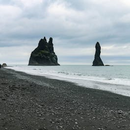 The sea stacks of Reynisdrangar rise off Iceland's South Coast.