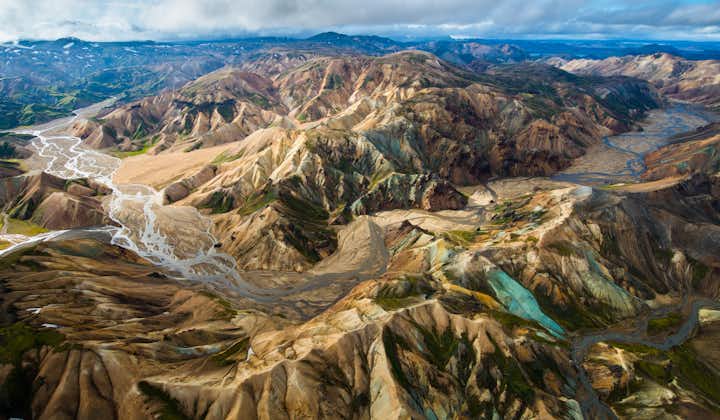 Discover the stunning landscapes of the Landmannalaugar mountain range on a highlands helicopter tour from Reykjavik.
