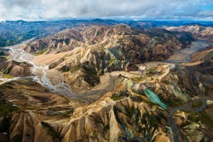 Discover the stunning landscapes of the Landmannalaugar mountain range on a highlands helicopter tour from Reykjavik.