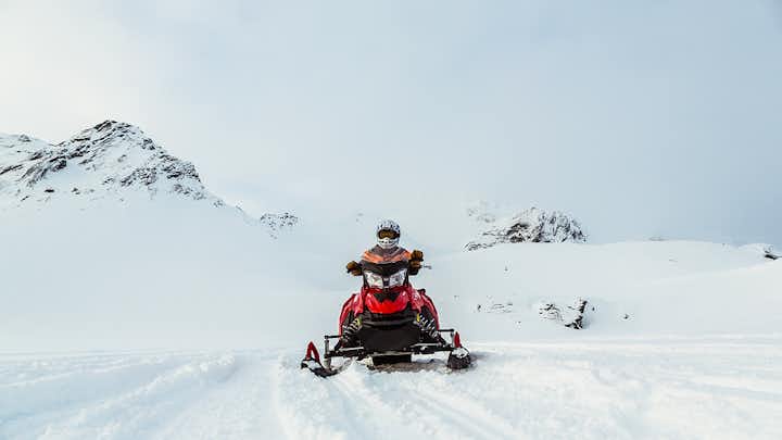 A single rider on a snowmobile tour of Langjokull glacier.