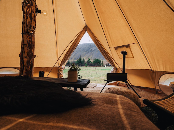 A view outside from the interior of a Golden Circle Tents unit.