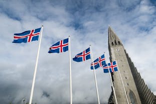 A row of Icelandic flags lead to Hallgrimskirkja church.