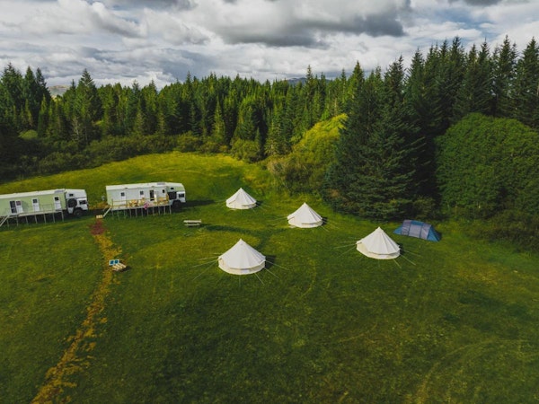 The campsite at Golden Circle Tents glamping experience, featuring four tents and two facilities blocks.