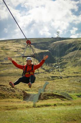 Traverse an expansive 0.6-mile (1-kilometer) stretch on Mega Zipline, capturing the sheer excitement of this heart-pounding Icelandic adventure.
