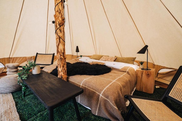 The interior of a glamping tent at the Golden Circle Tents Glamping Experience.