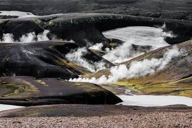 Steam rises from the ground at a geothermal area in the Icelandic Highlands.
