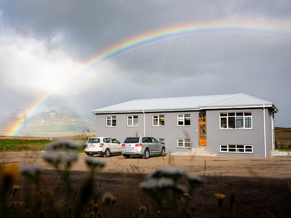 A rainbow above Soti Lodge on the Trollaskagi Peninsula in North Iceland.