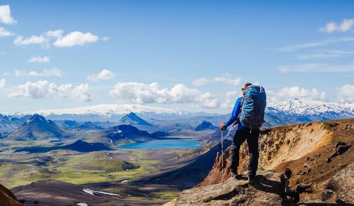 A hiker enjoying the view of the Icelandic Highlands.