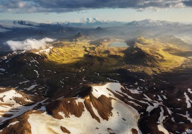 A panoramic view of the Highlands of Iceland with the Alftavatn lake seen in the distance.