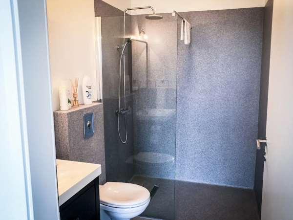 Indulge in comfort and convenience with the comfortable shower, providing a relaxing and rejuvenating experience after a day of 
