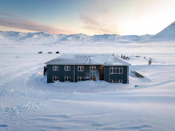 Soti Lodge looks stunning amid a snow-covered landscape during winter.